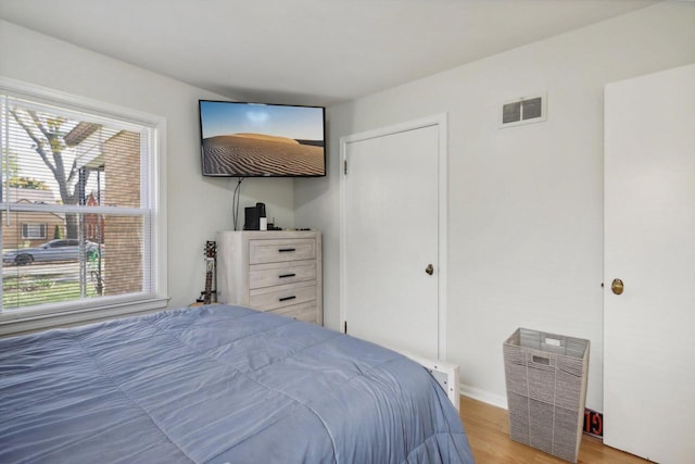 bedroom featuring light hardwood / wood-style flooring