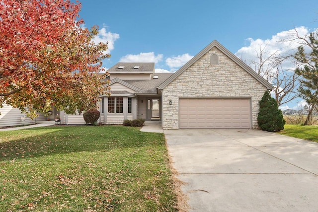 view of front of home with a garage and a front yard