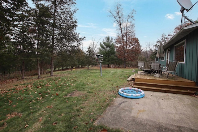 view of yard with a deck