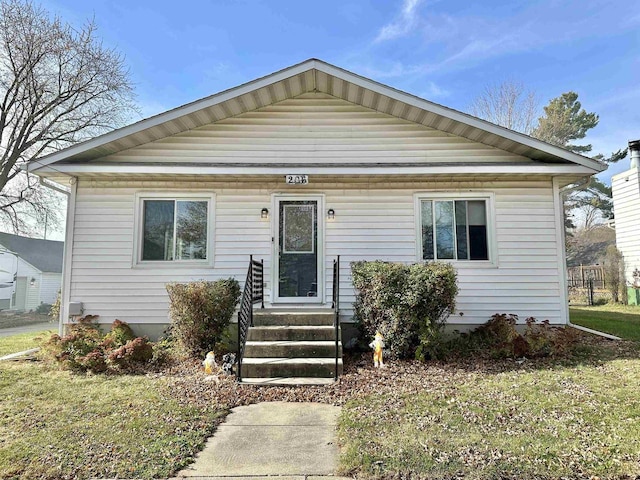 view of front of home with a front yard