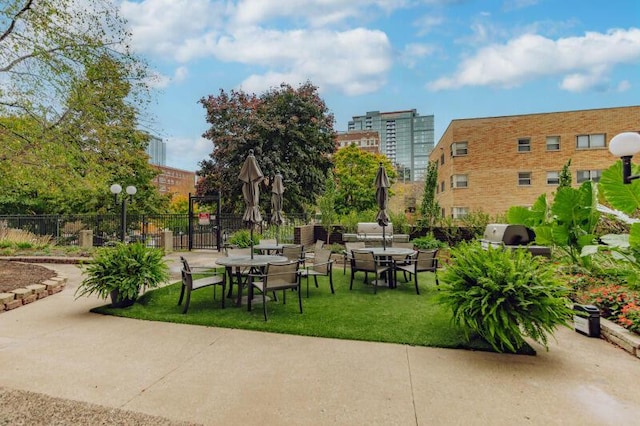 view of home's community with a lawn