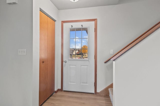 entryway with light hardwood / wood-style flooring