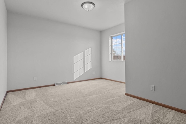 spare room with carpet flooring