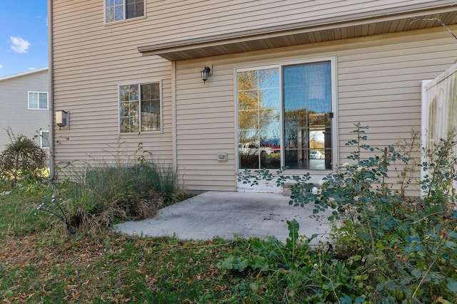 property entrance with a patio area