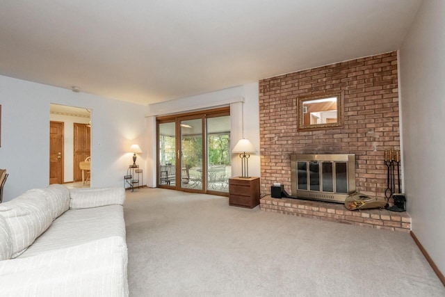 carpeted living room with a fireplace