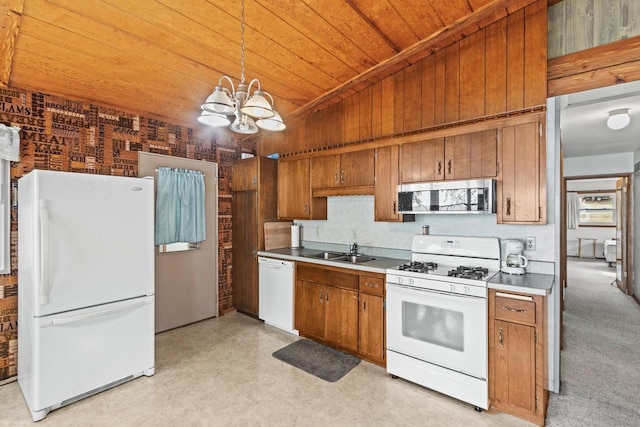 kitchen with wood ceiling, a chandelier, sink, white appliances, and decorative light fixtures