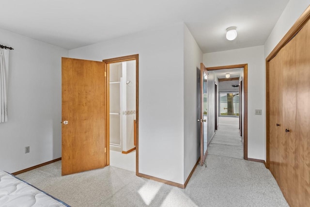 W11384 Bay Dr, Lodi, WI 53555 - hallway with light colored carpet and baseboards