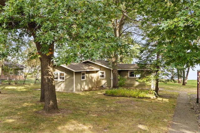 exterior space featuring a front yard