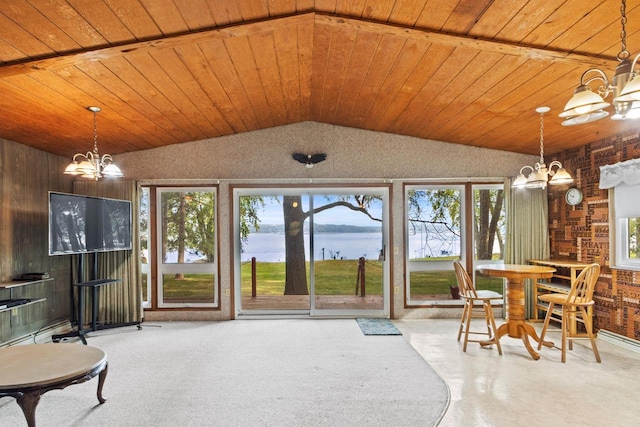 interior space with wooden ceiling, a chandelier, a water view, and lofted ceiling with beams