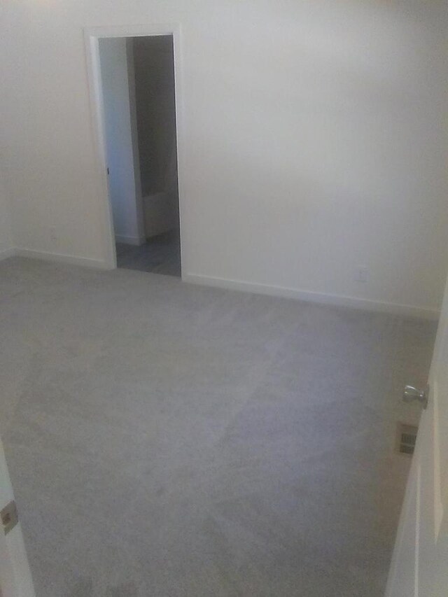 empty room featuring carpet