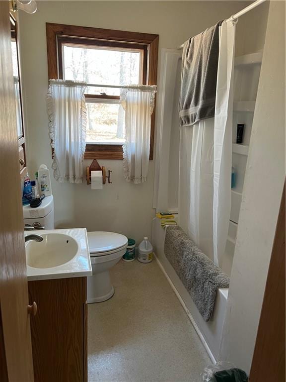 full bathroom featuring vanity, toilet, and shower / bathtub combination with curtain