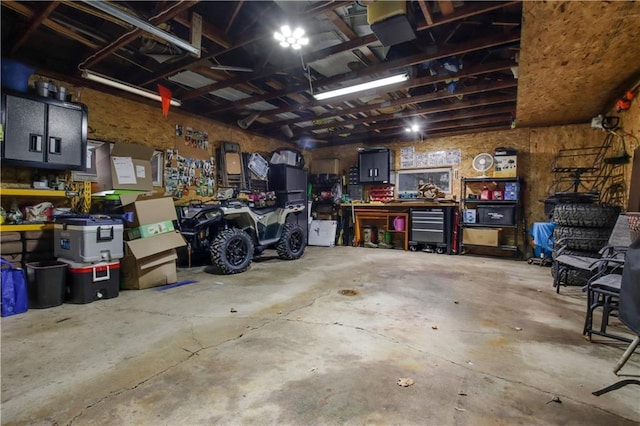 garage with a workshop area