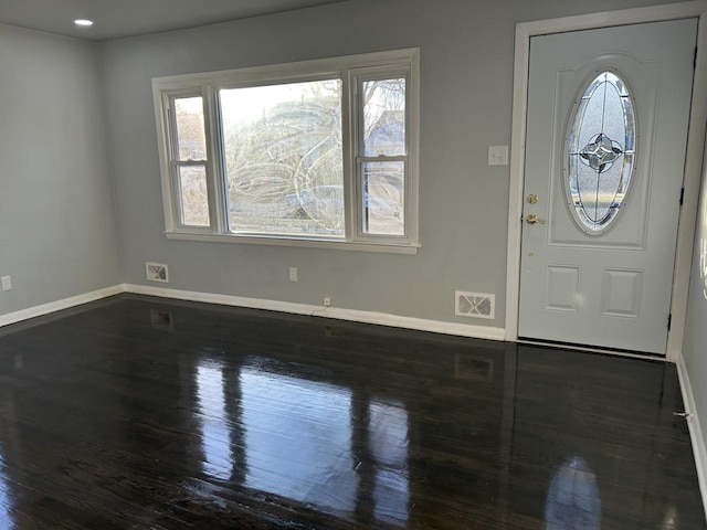 entryway featuring dark wood-type flooring