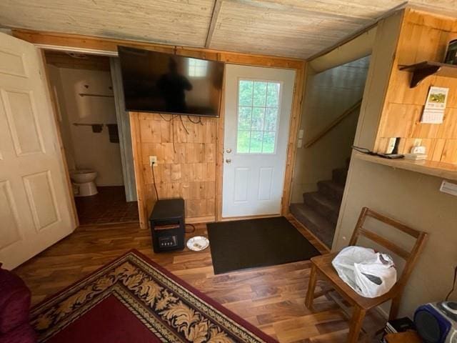 entryway featuring hardwood / wood-style floors and wood ceiling