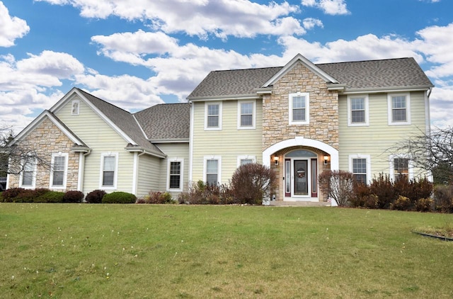 view of front of home with a front yard