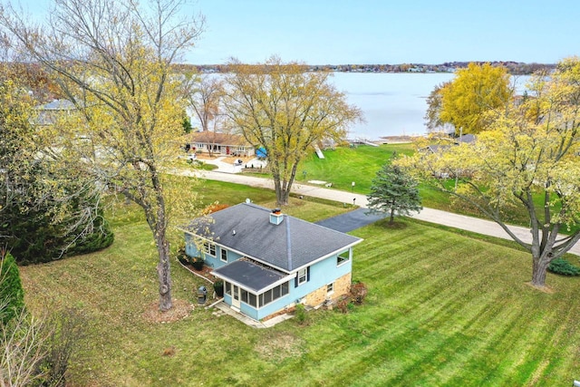 bird's eye view with a water view