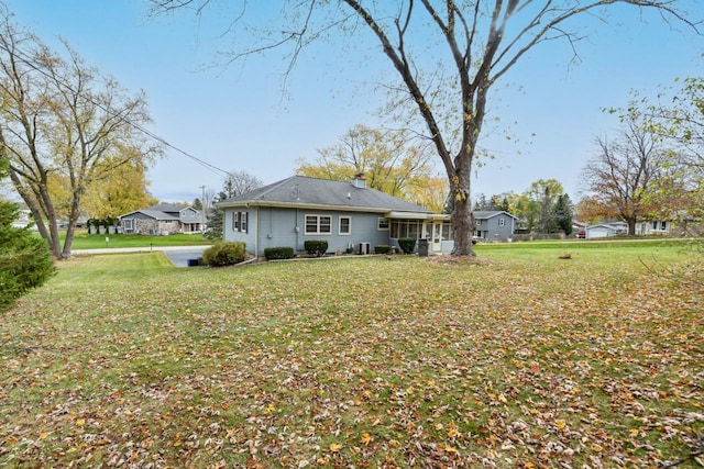 exterior space with a yard