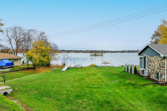 view of yard with a water view