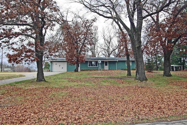 ranch-style home with a garage