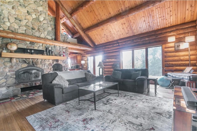 living room featuring dark wood-type flooring, wooden ceiling, rustic walls, high vaulted ceiling, and a fireplace