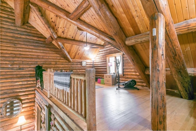 bonus room with rustic walls, wood ceiling, vaulted ceiling with beams, and wood-type flooring