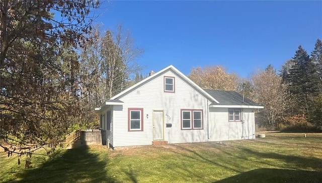 6970 Second St, Loretta, WI 54896 - back of house with a yard