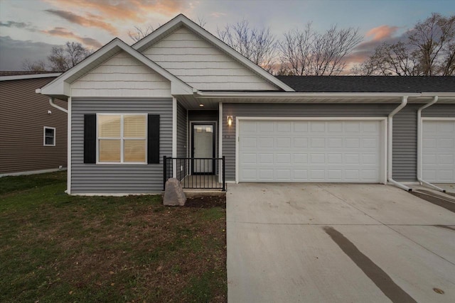 view of front of property with a garage