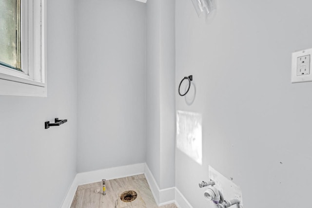 bathroom featuring hardwood / wood-style flooring