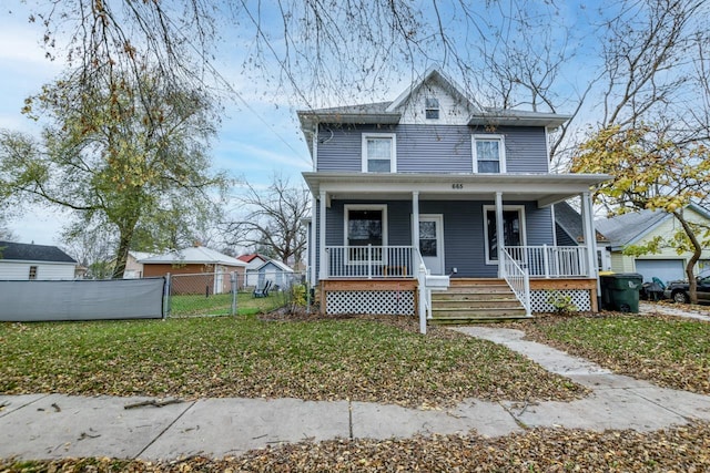 view of front facade featuring a porch and a front lawn