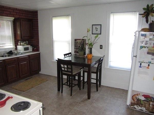 dining room featuring sink