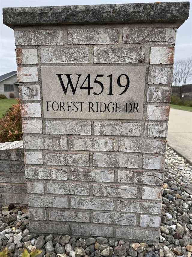 view of community sign