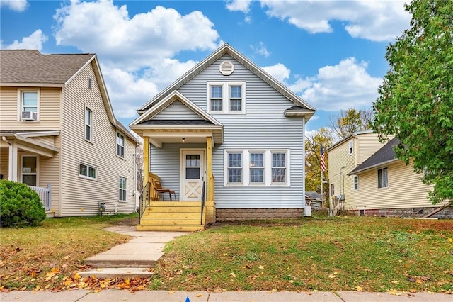 view of front facade featuring a front yard