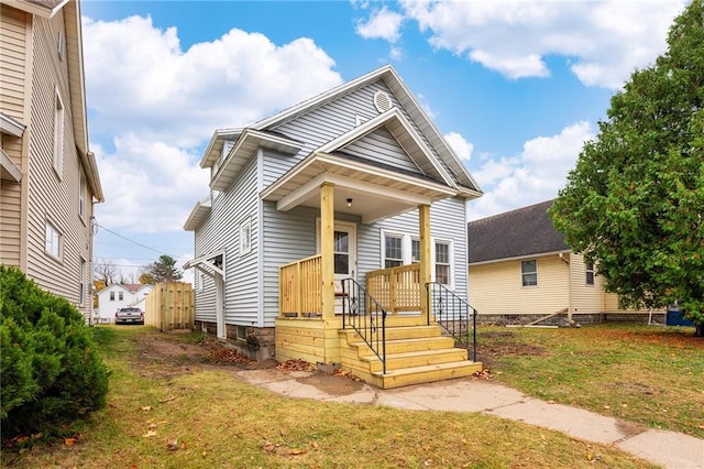 view of front of property with a front lawn