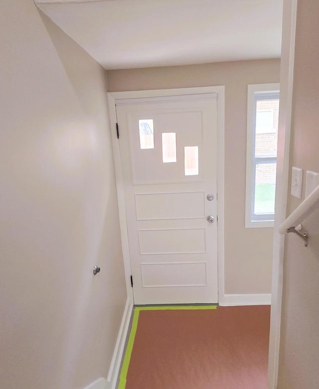 doorway featuring hardwood / wood-style floors