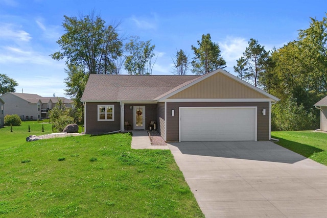 ranch-style home with a garage and a front lawn