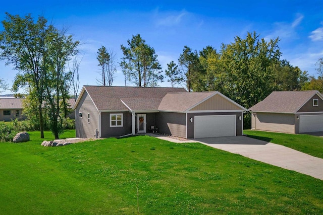 single story home featuring a garage and a front yard