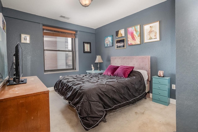 bedroom featuring carpet