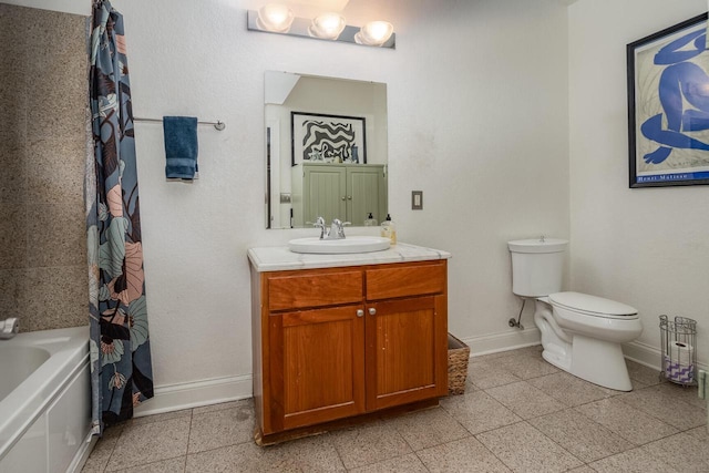 full bathroom with vanity, shower / tub combo, and toilet