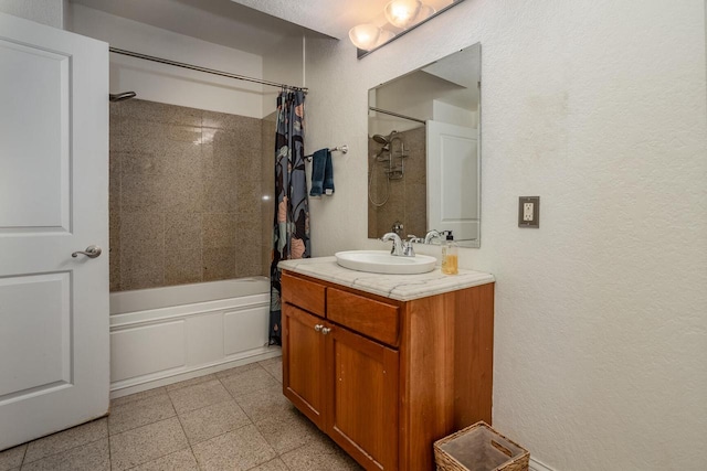 bathroom featuring vanity and shower / bath combo with shower curtain