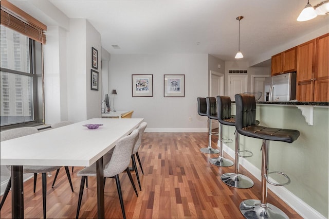 dining room featuring hardwood / wood-style flooring