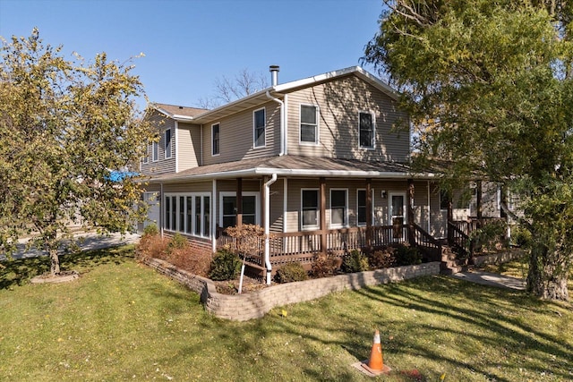 back of property featuring a porch and a lawn