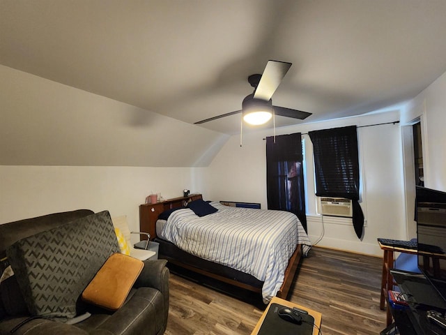 bedroom with hardwood / wood-style flooring, ceiling fan, cooling unit, and lofted ceiling