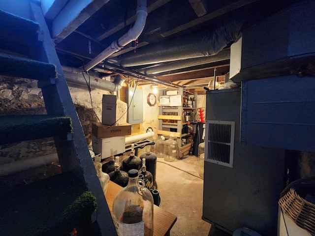 basement featuring electric panel