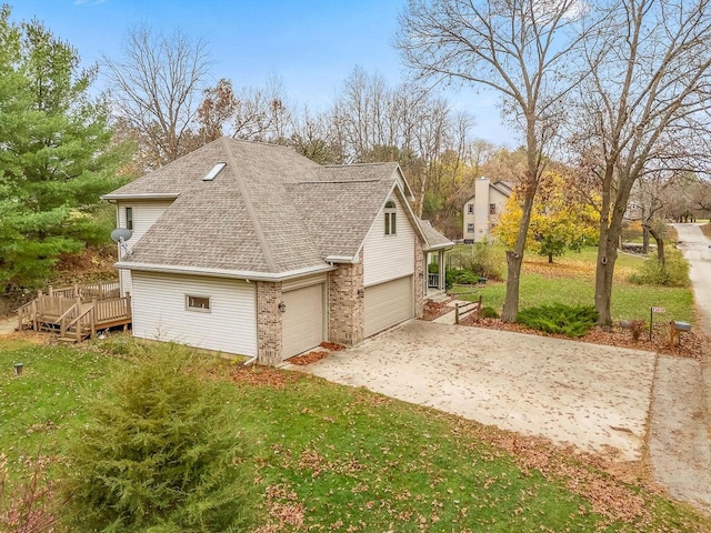 view of side of property featuring a lawn and a wooden deck