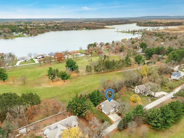 drone / aerial view with a water view