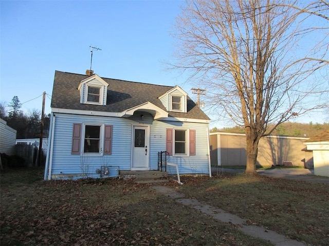 view of new england style home