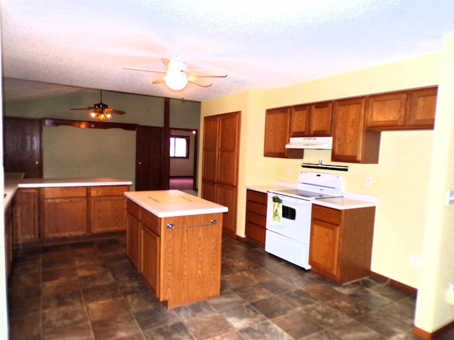 701 S Adams St, Thorp, WI 54771 - kitchen featuring white electric stove, brown cabinets, a ceiling fan, under cabinet range hood, and a center island