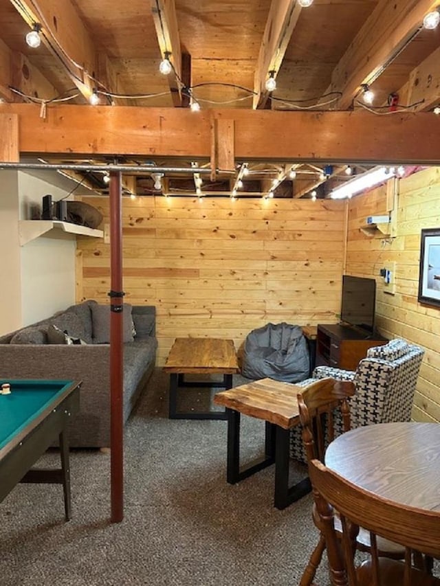 basement with wooden walls, carpet floors, wooden ceiling, and pool table