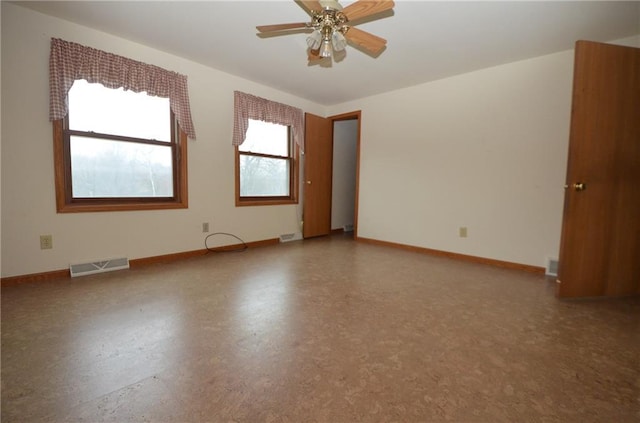 unfurnished room featuring ceiling fan