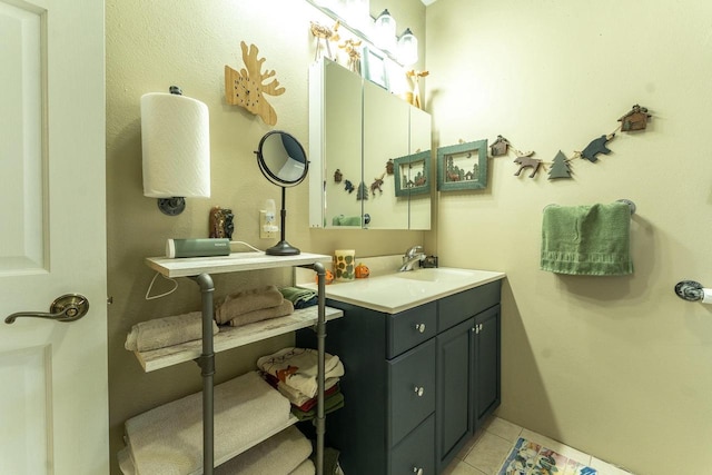 bathroom with vanity and tile patterned flooring